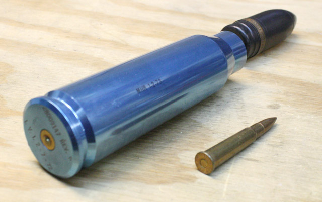 Blue 30mm GAU-8 shell next to .303